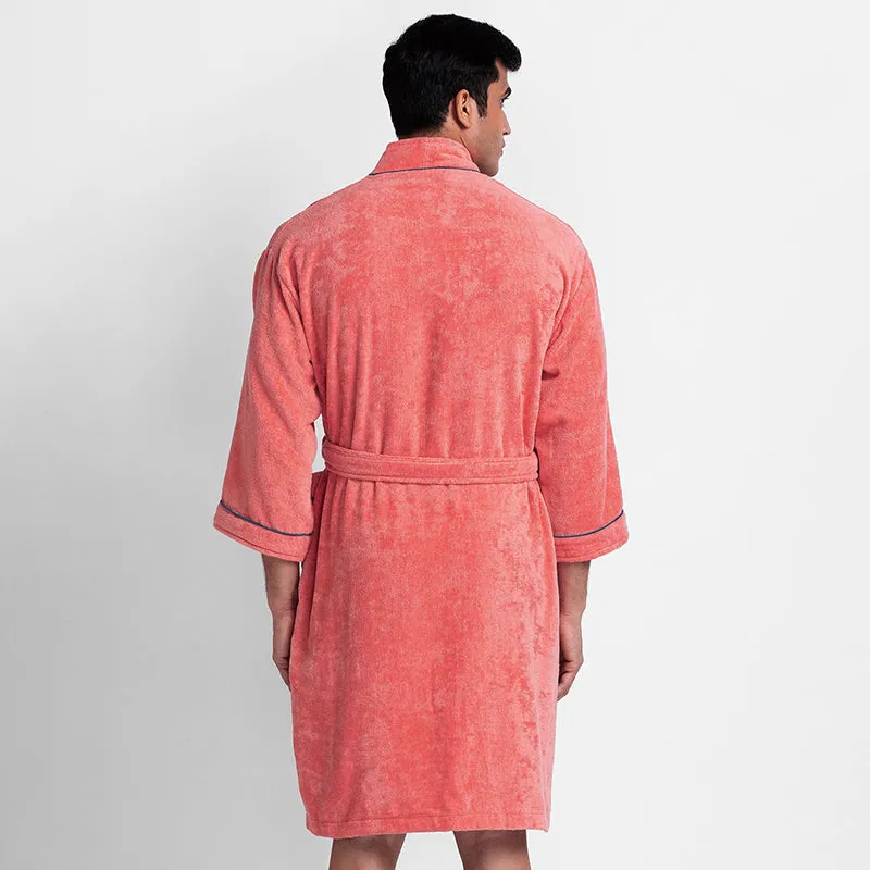 Back view of the peach bath robe showing its plain soft finish