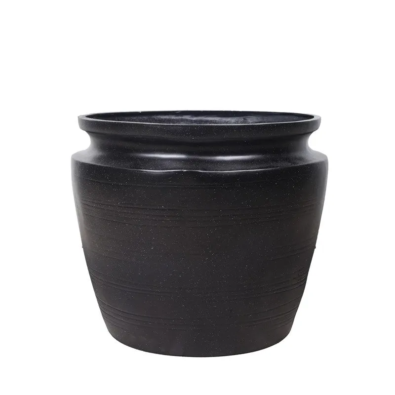 Close view of the black urn planter showing its wide rim and ridged surface