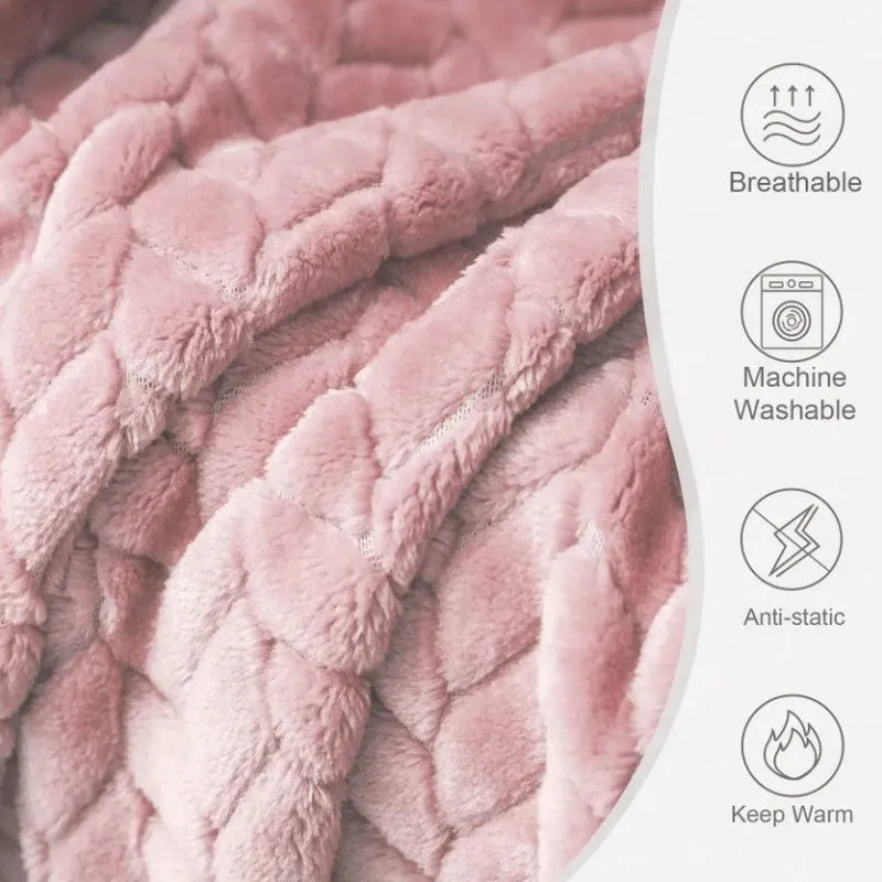 Close-up of the soft raised texture on a peach blanket