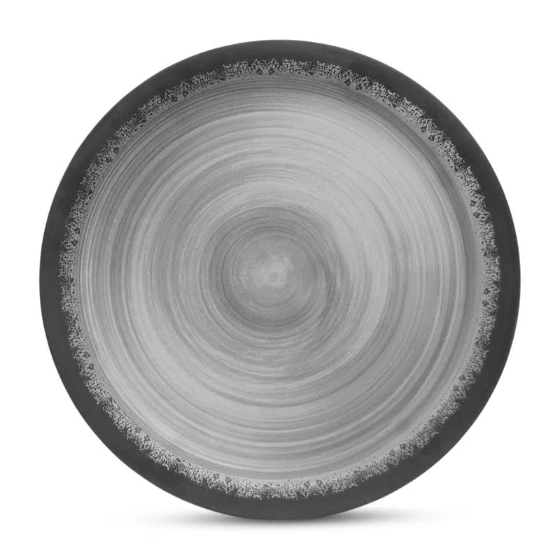 Close-up of a round black and grey plate with concentric textured detailing