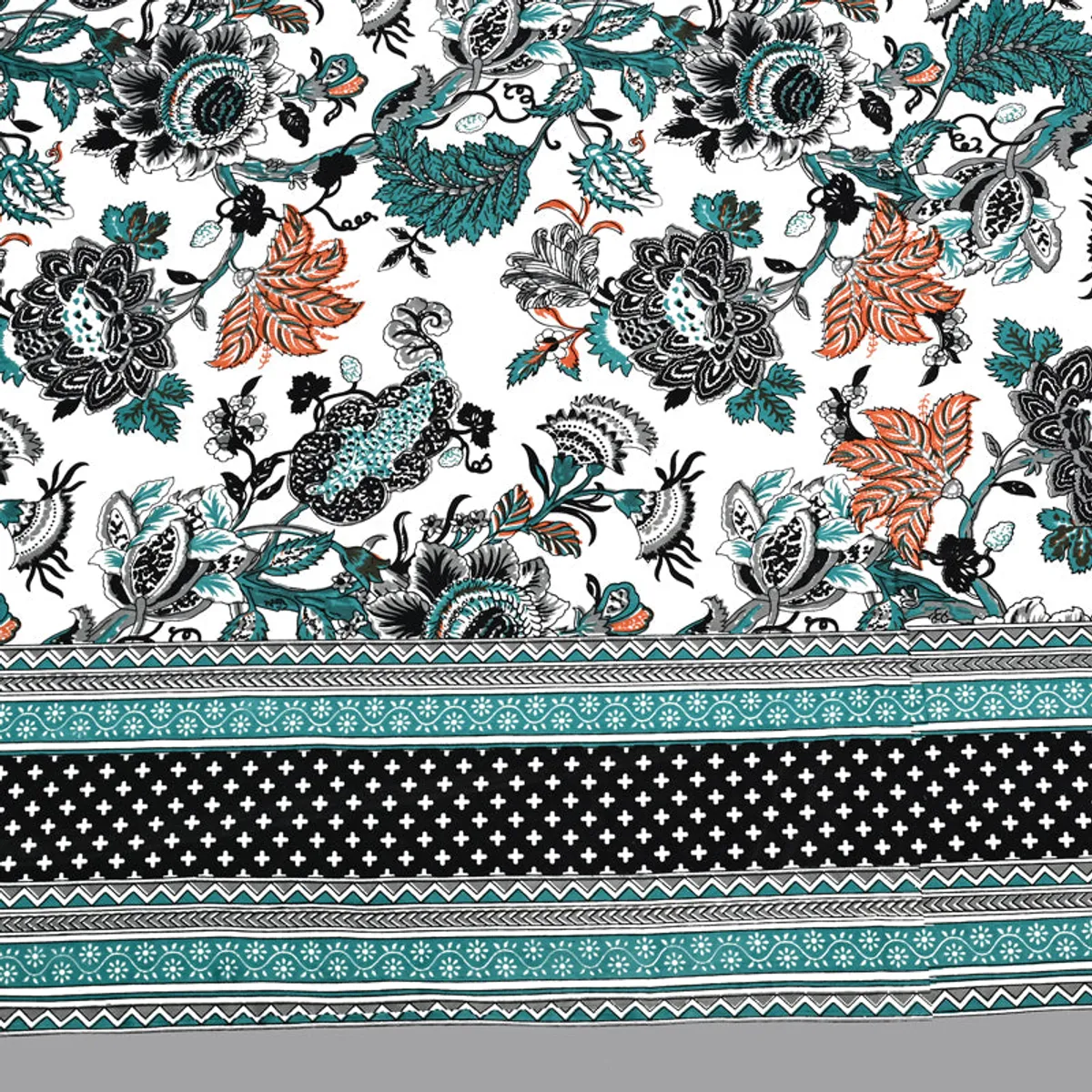 Close-up of the floral and border pattern on the bedsheet