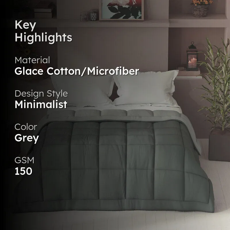 Grey comforter on a bed with material, style, colour and GSM highlights