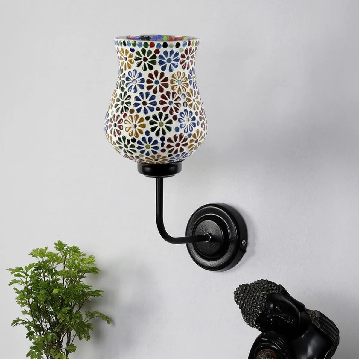 Wall-mounted lamp with white floral mosaic glass shade and black arm