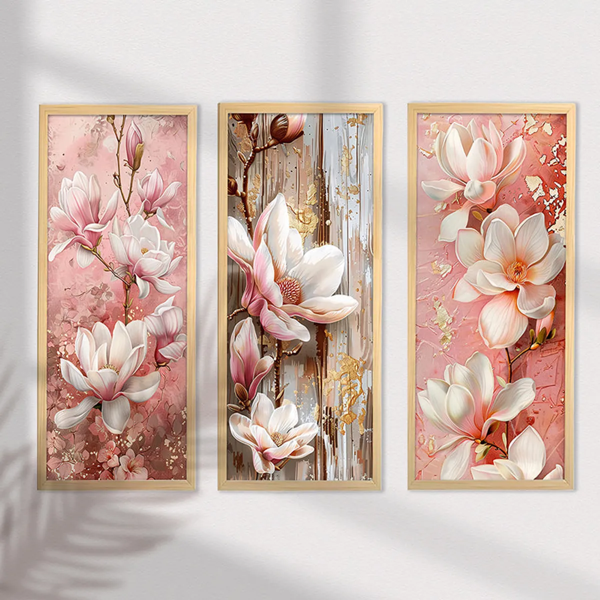 Framed pink floral wall art triptych with soft shadows on the wall