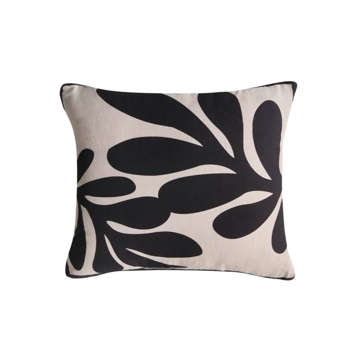 Close view of a black and off-white abstract leaf cushion cover