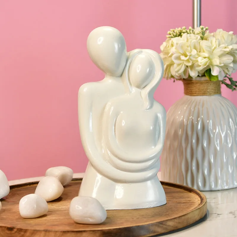 Warmth Of Embrace Resin Showpiece media 1