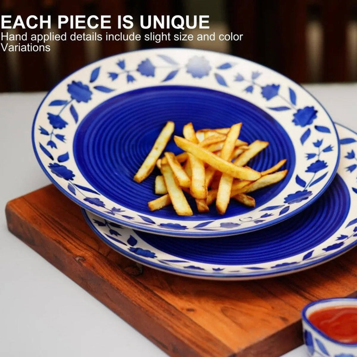 Close view of a blue floral ceramic plate with food