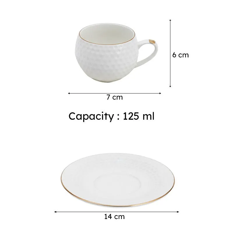 White textured cup and saucer shown with dimensions and capacity