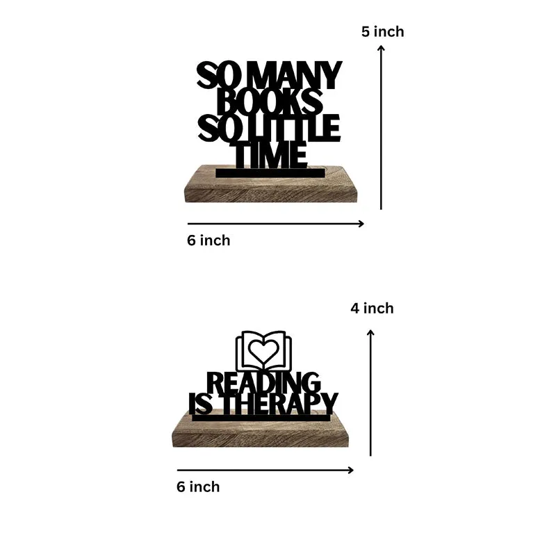 Typography showpieces on wooden bases against a white background