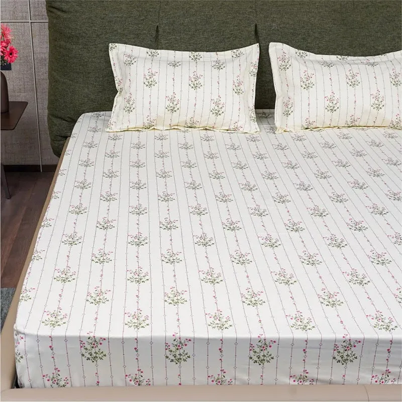 Top view of floral striped bedsheet with two matching pillow covers