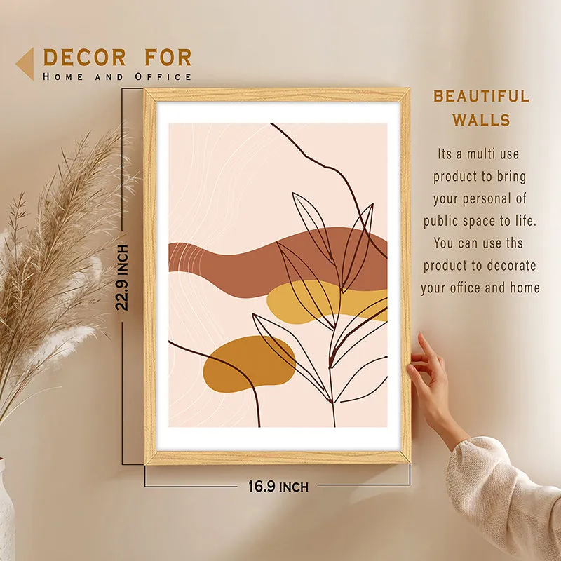 Framed abstract botanical wall art displayed on a beige wall with pampas stems
