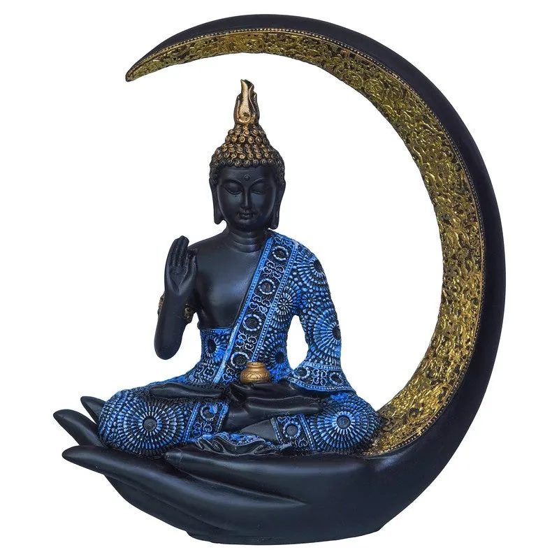 Buddha idol with blue patterned robe and gold crescent against white background