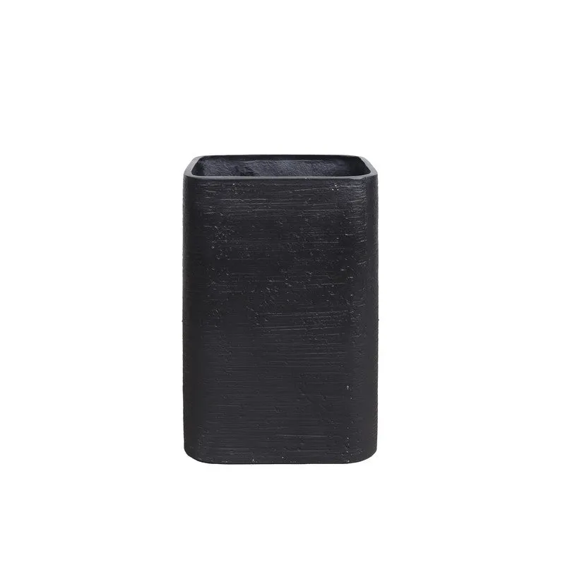 Empty black planter showing its open top and rounded vertical edges