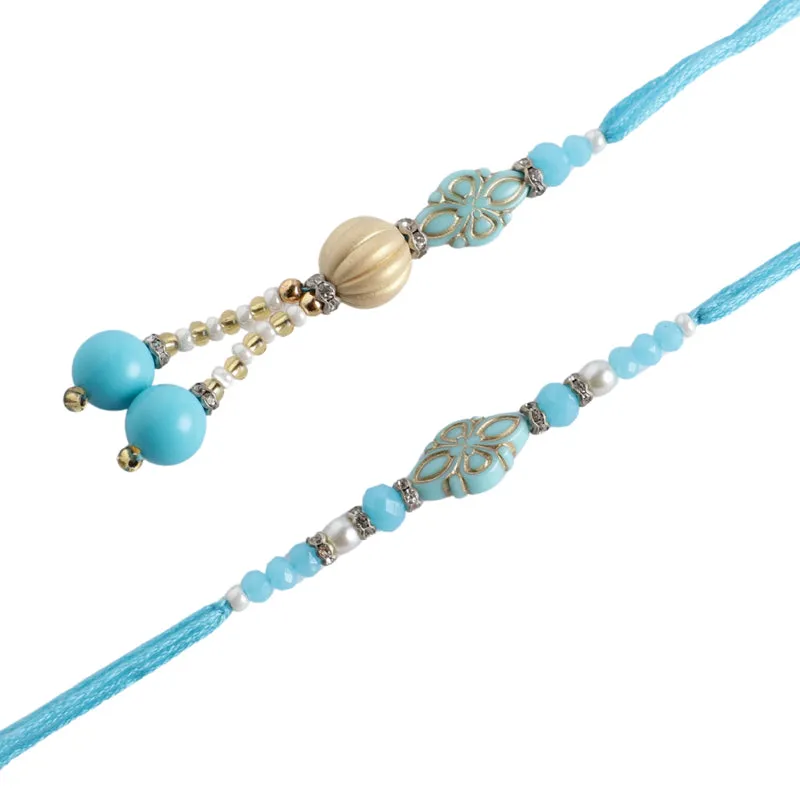 Bhaiya-Bhabhi Rakhi with Roli Chawal - Three Piece Set media 6