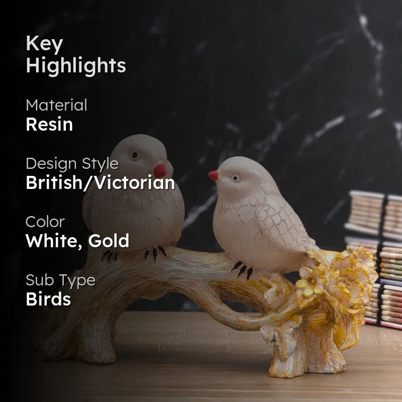 Two white birds on a gold-toned branch shown with product highlights.