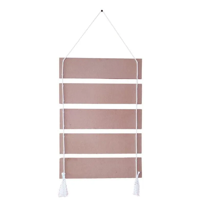 Back view of the five-panel wall hanging with hanging cord and tassels