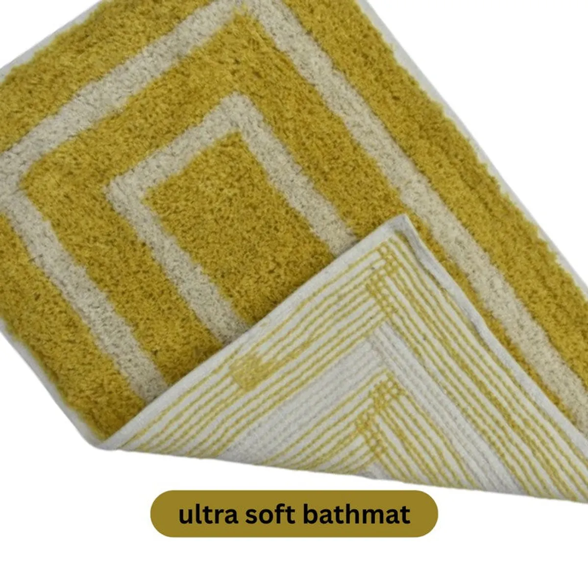 Bath mat corner lifted to show the yellow and white striped underside