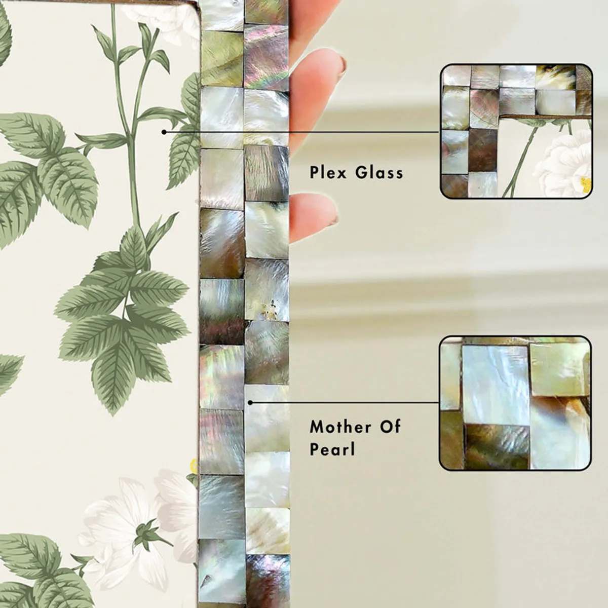 Close-up of the iridescent mother-of-pearl mosaic border and floral photo area.