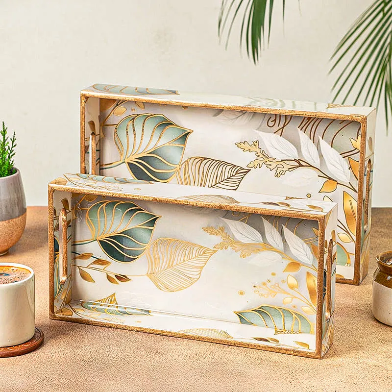 Set of two rectangular serving trays with white, teal and gold botanical design