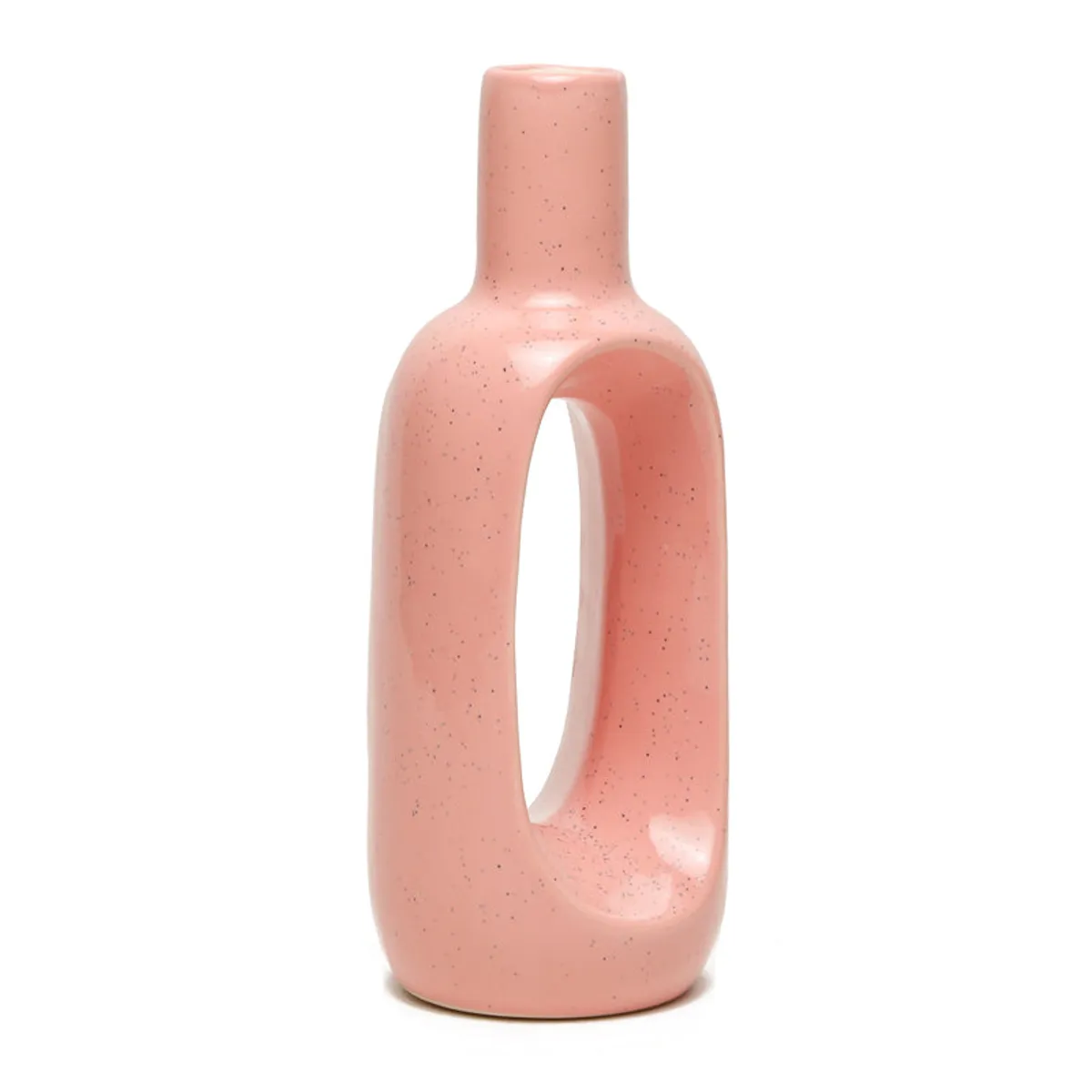 Angled view of a pink speckled ceramic donut vase