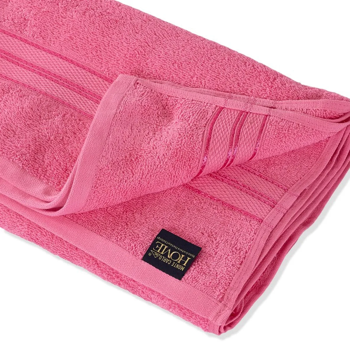 Close-up of the pink towel's soft terry texture and bordered edge