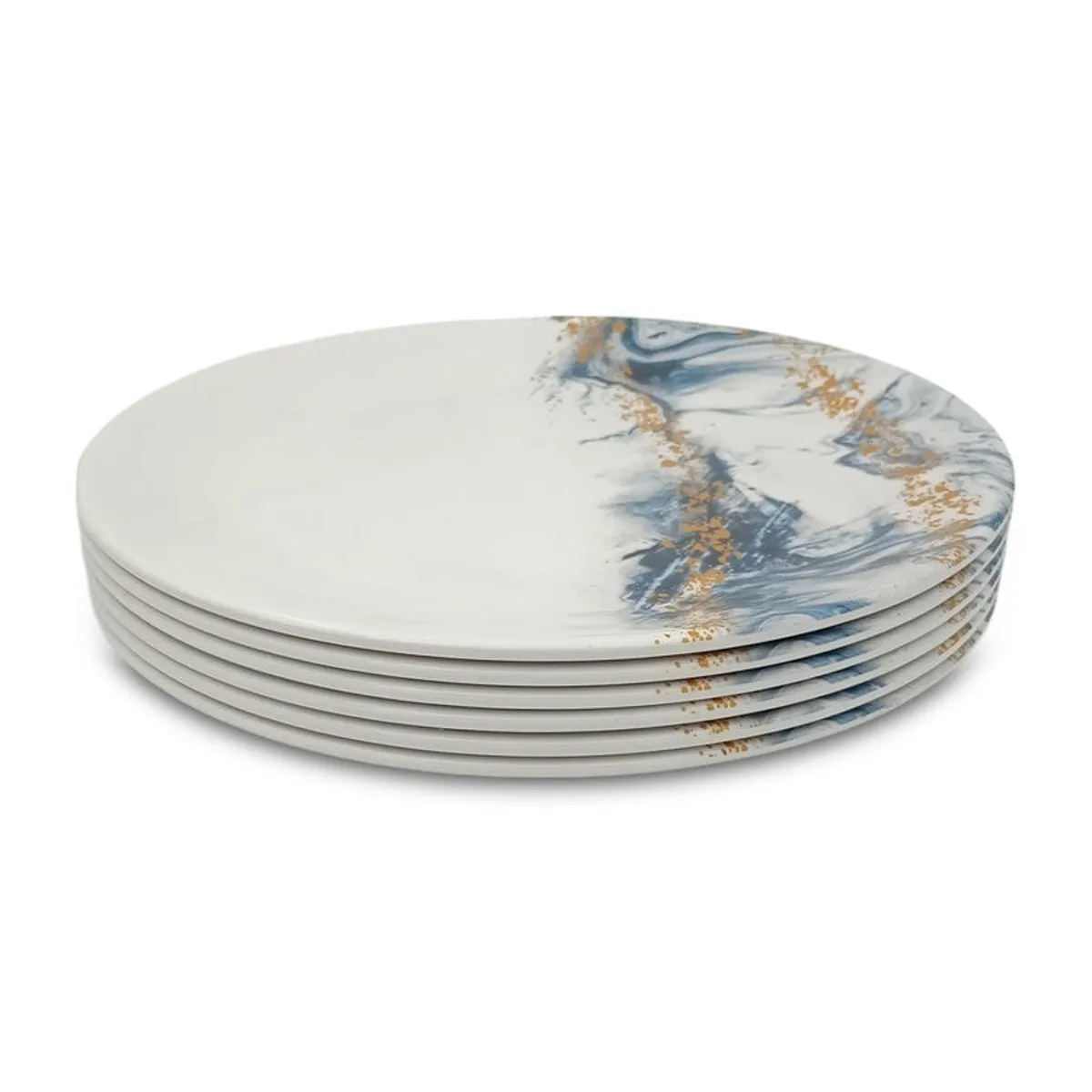 Stacked white round dinner plates with blue and gold marbled detailing