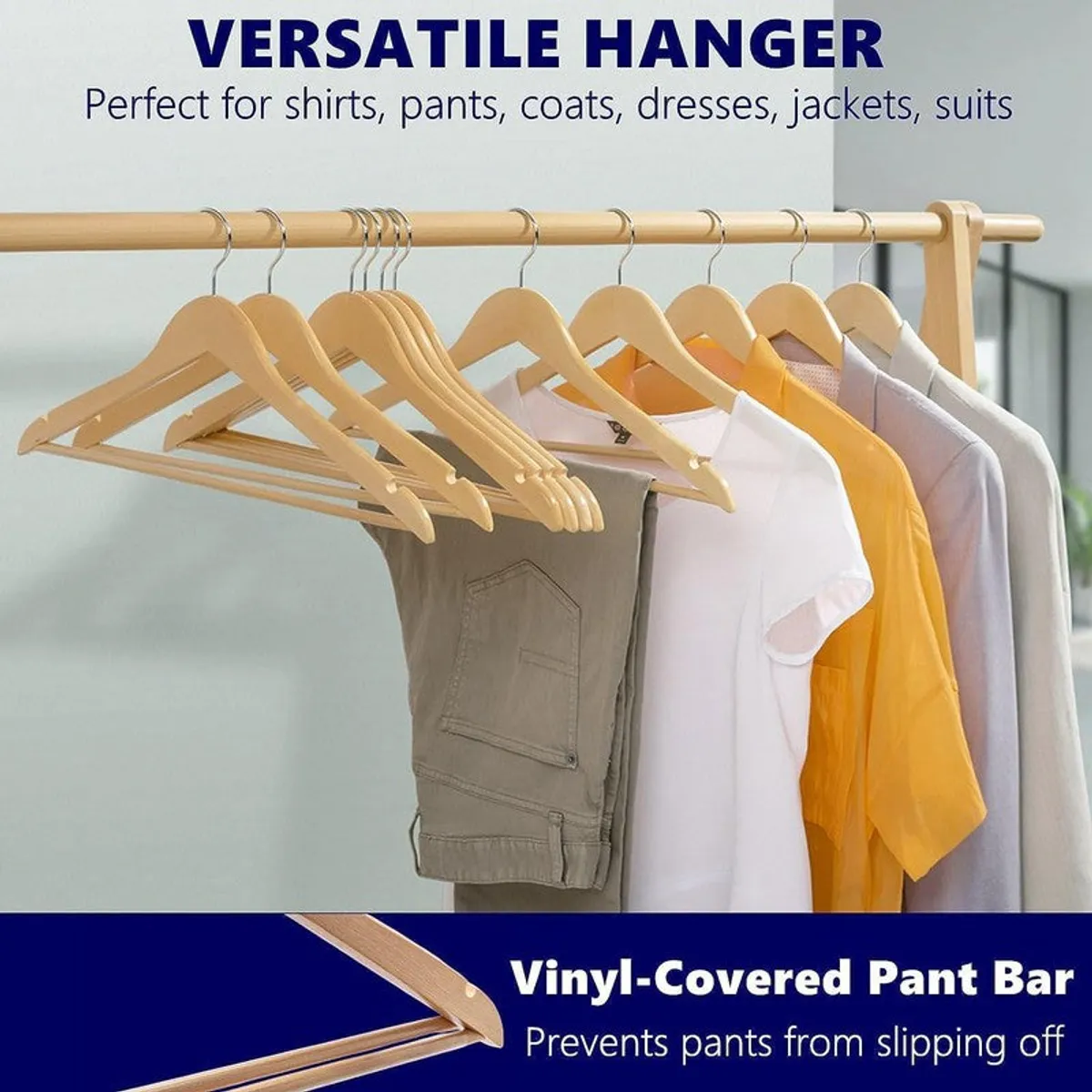 Wooden hangers holding shirts and trousers on a rail