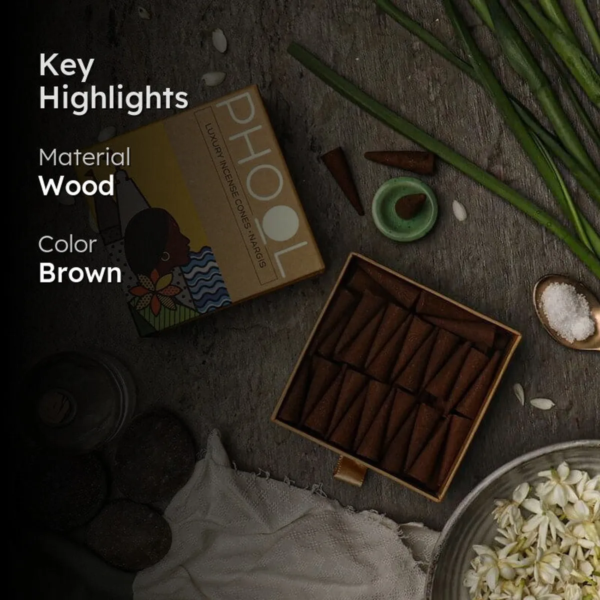 Box of incense cones with illustrated packaging on a rustic background