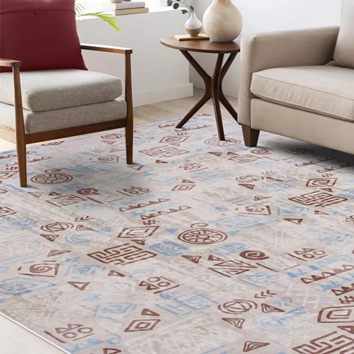 Abstract beige carpet with brown and blue geometric motifs in a furnished living room
