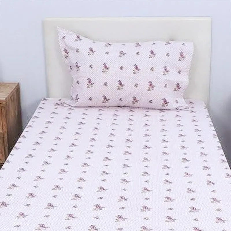 Front view of pink floral bedsheet with matching pillow cover