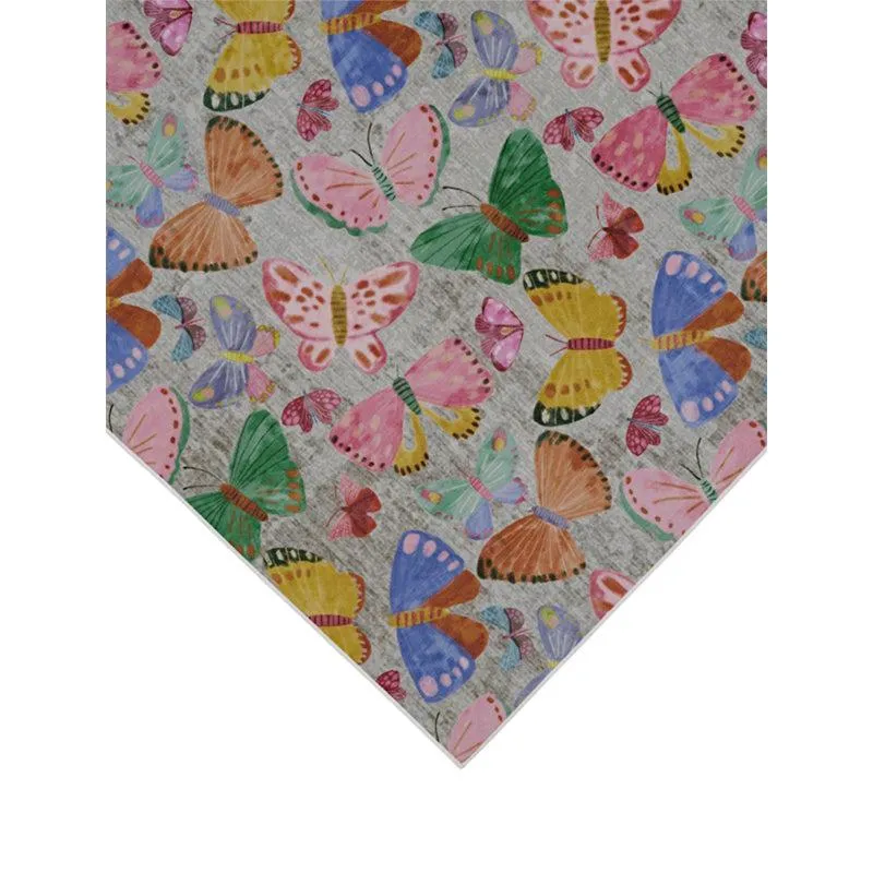 Angled view of multicolour butterfly motif carpet