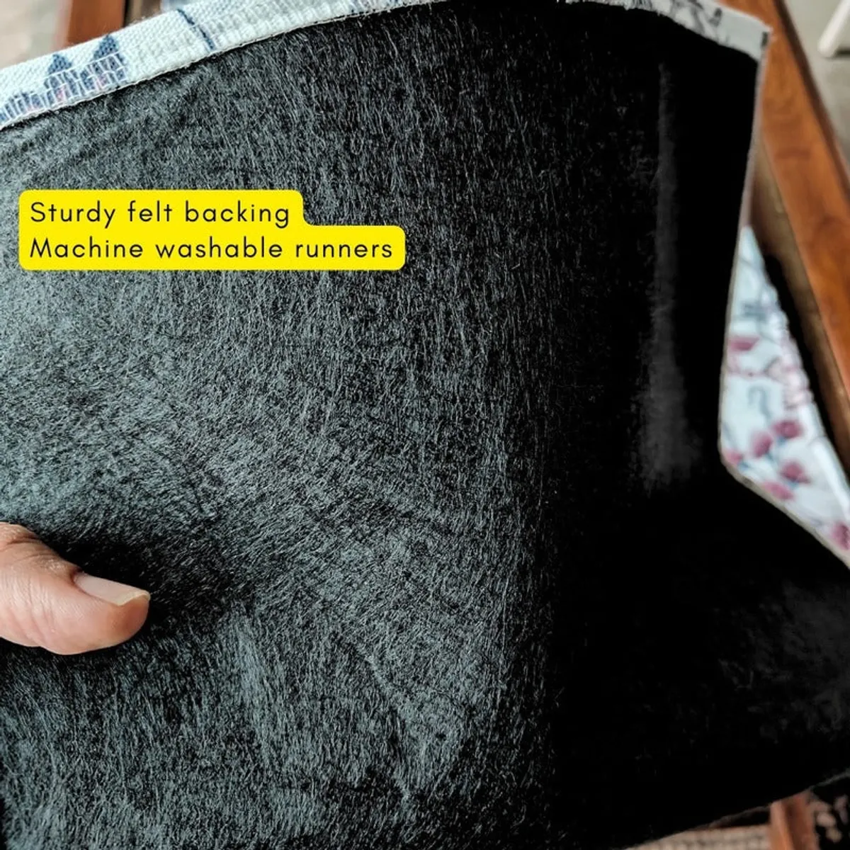 Reverse side of the table runner showing its dark backing
