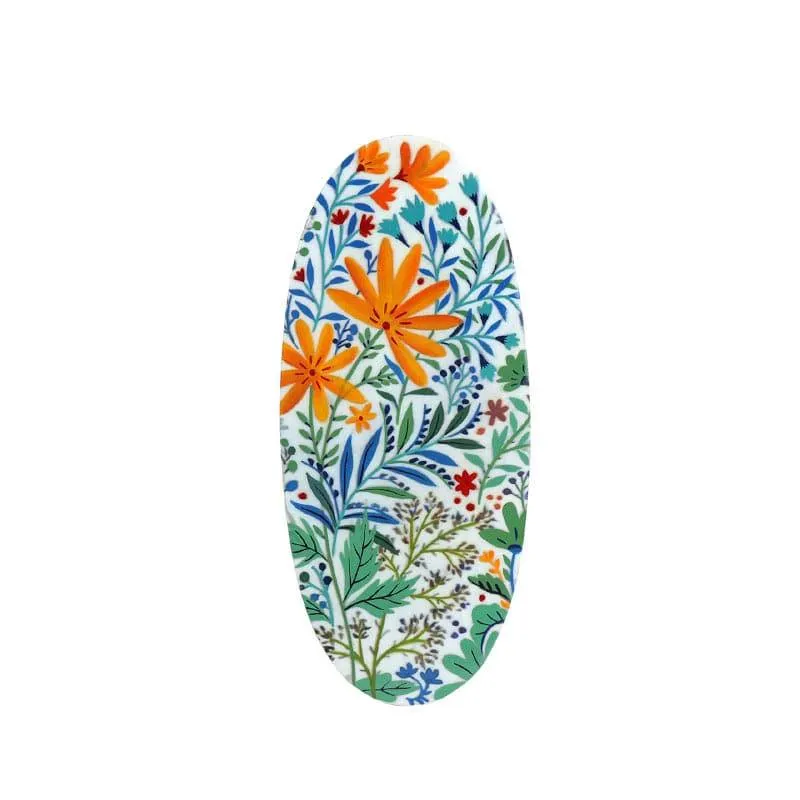 Close view of the oval wall accent featuring colourful botanical flowers and foliage