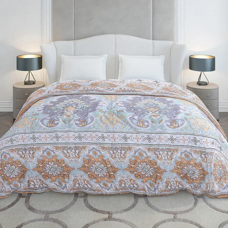 Duvet cover displayed across a bed with layered ornamental bands