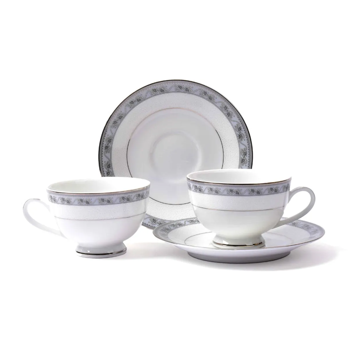 Two matching white tea cups and saucers with grey floral detailing
