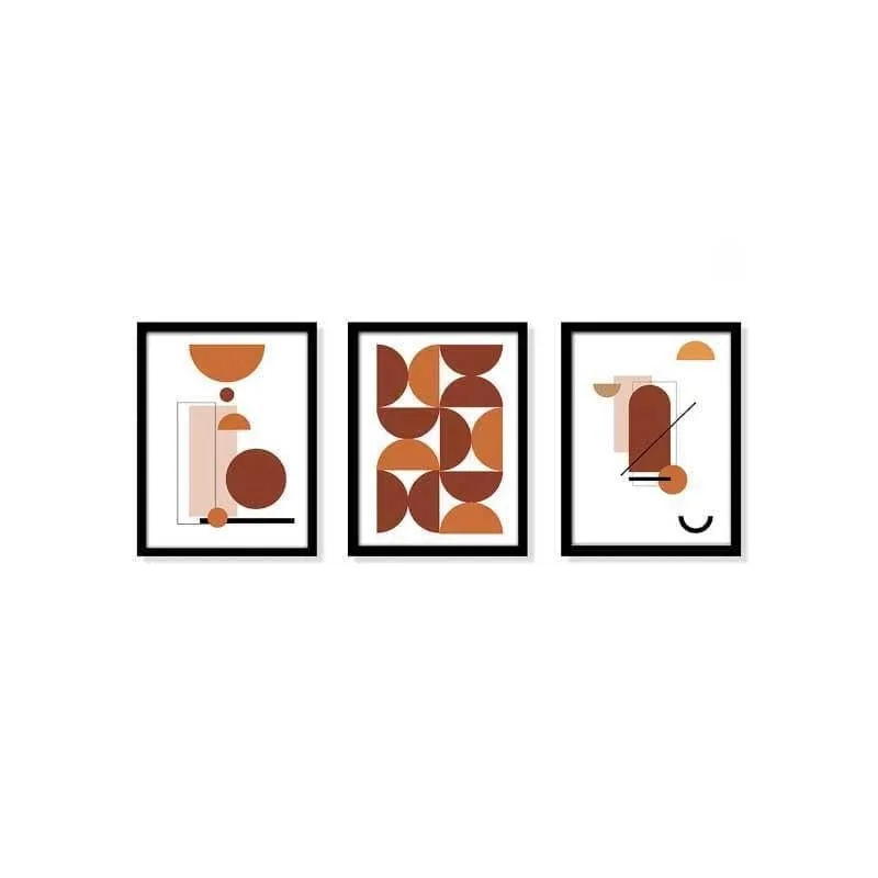 Three framed abstract geometric prints arranged in a row on a plain white wall