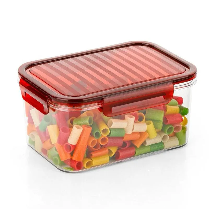 Close-up of a transparent rectangular food container with a red lid