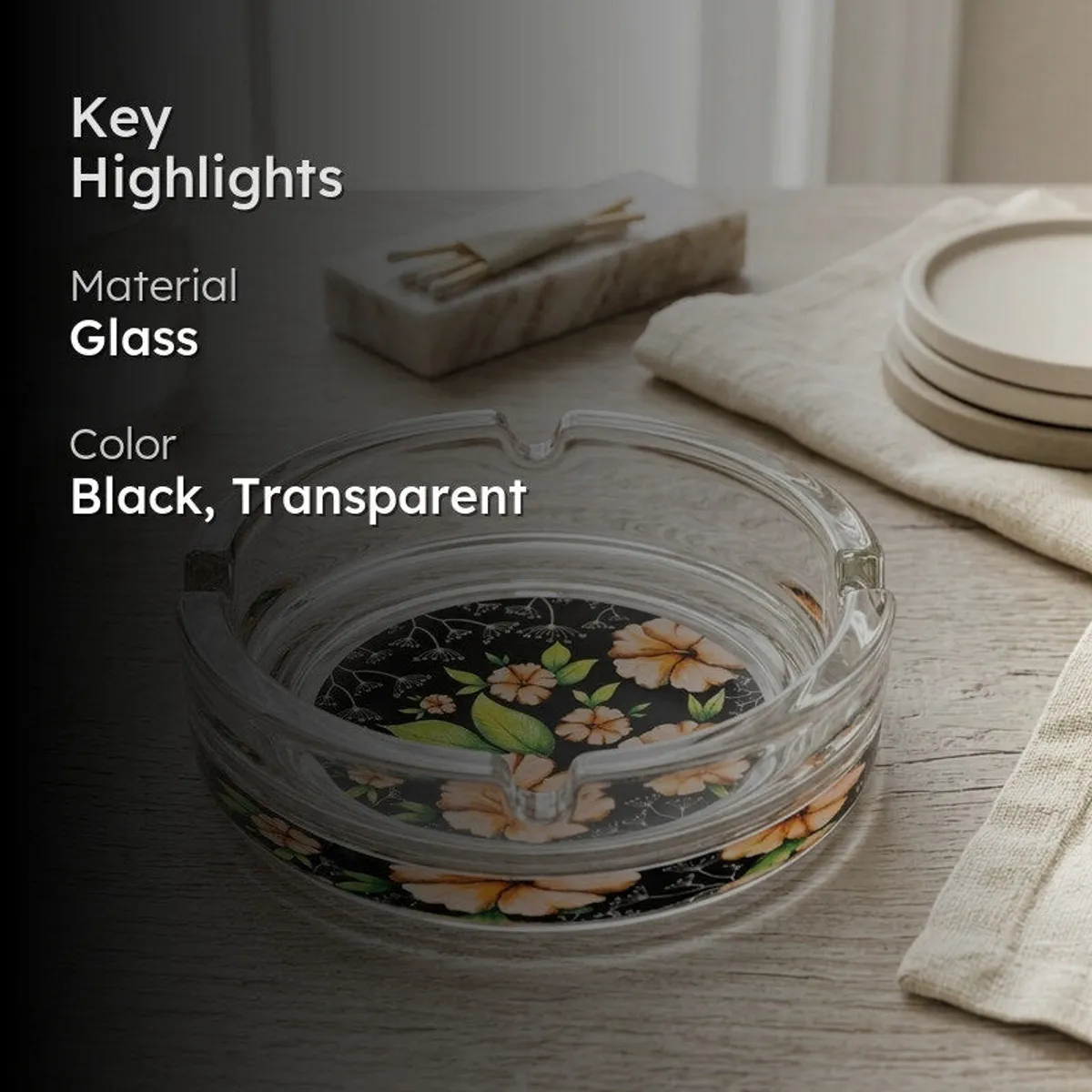Floral glass ashtray shown in a styled tabletop setting