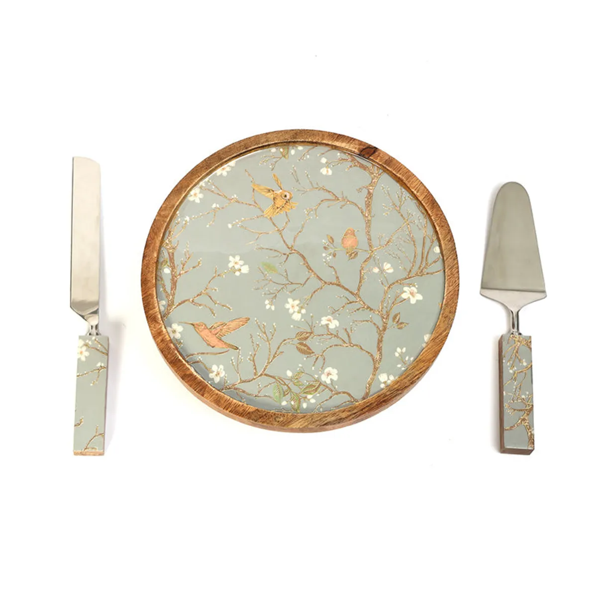 Top view of grey bird and floral cake stand with knife and server