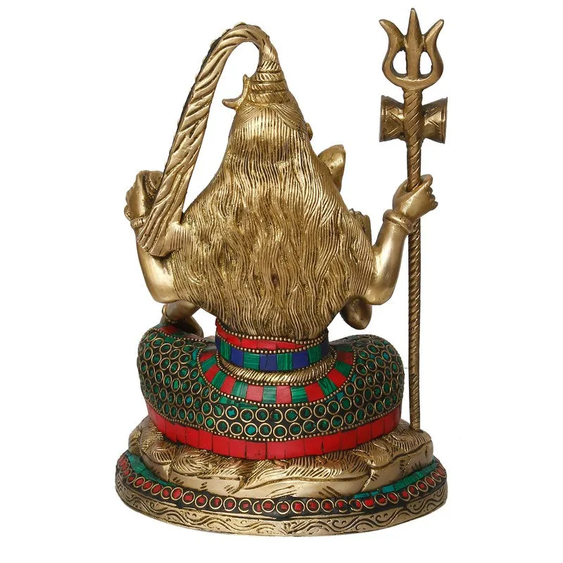 Rear view of the idol showing textured hair and decorated base