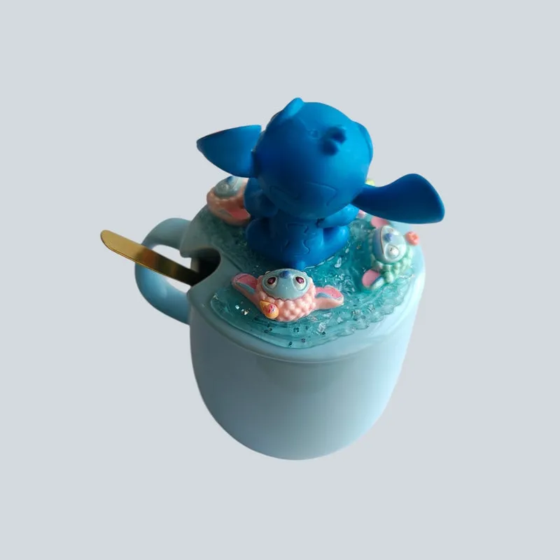 Top angled view of the mug with sculpted figurine lid and spoon slot