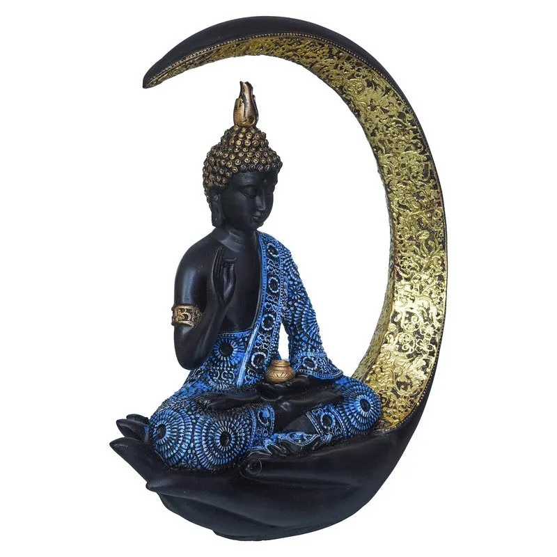 Three-quarter view of Buddha idol with blue robe and black crescent base