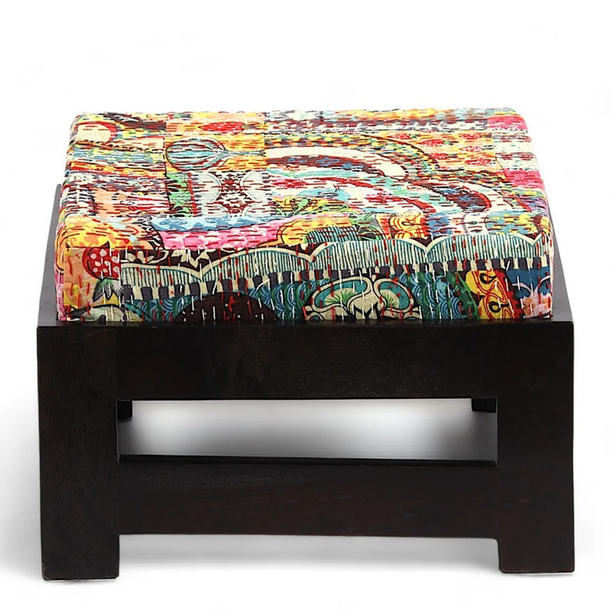 Dark wooden stool with a bright multicolour patterned cushion