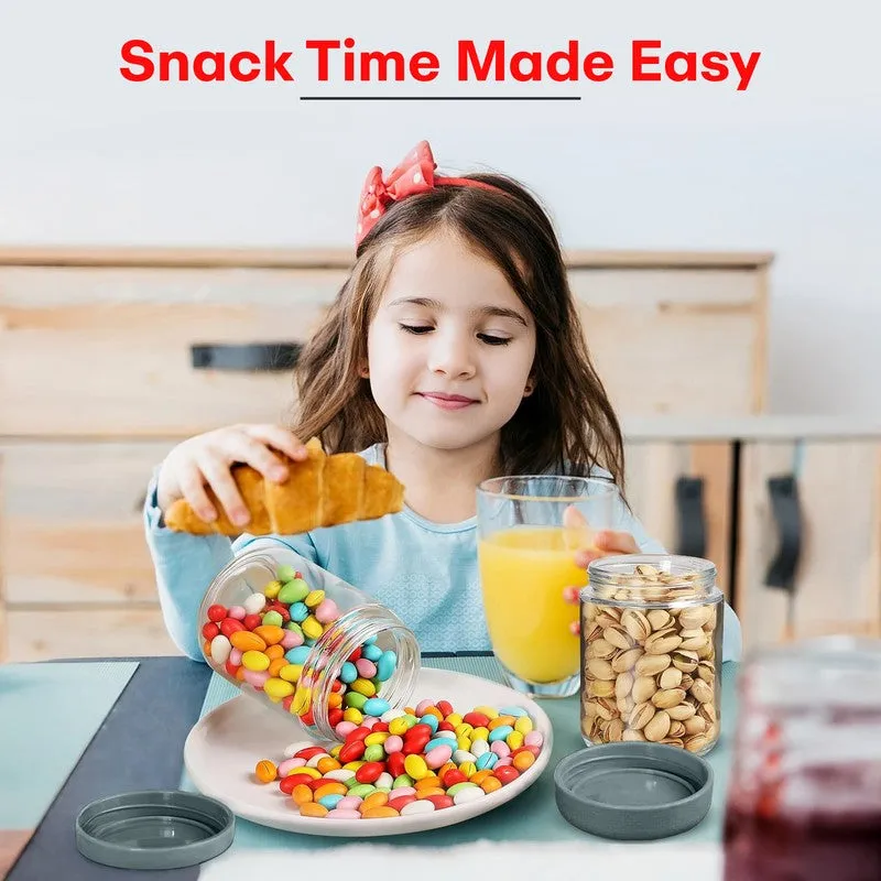 Child enjoying snacks beside a clear storage jar and colourful sweets.