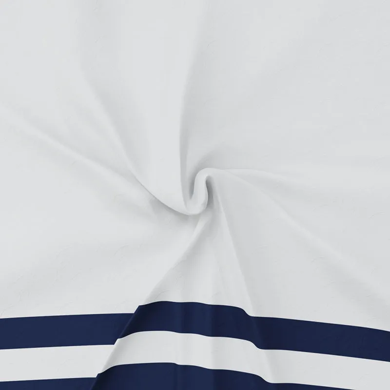 White bedsheet fabric gathered to show its soft, smooth surface and navy border stripe.