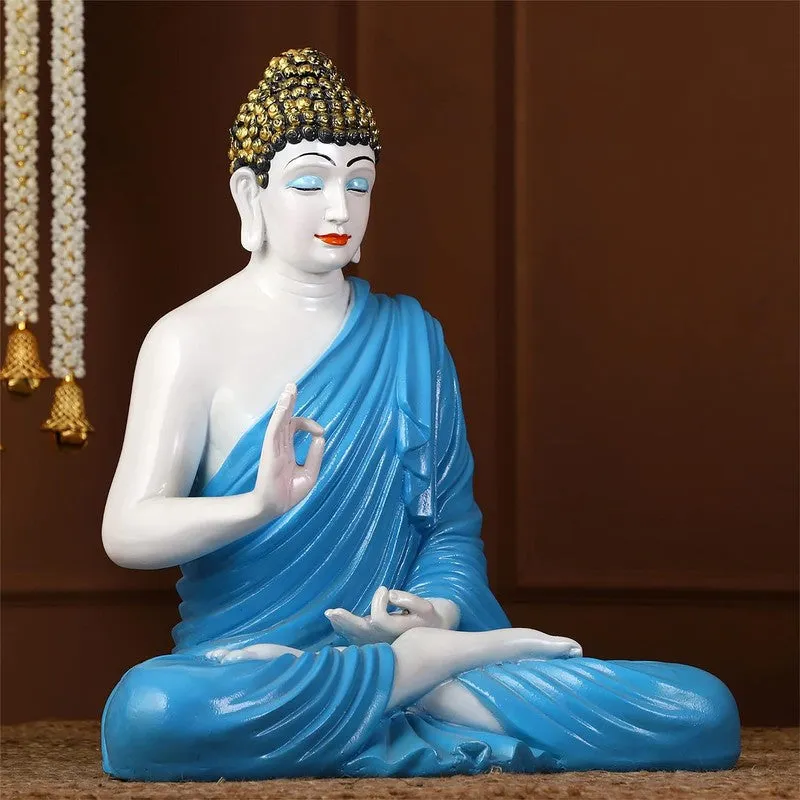 Angled view of blue and white seated Buddha showpiece