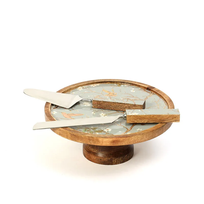 Cake stand with matching knife and server arranged on top