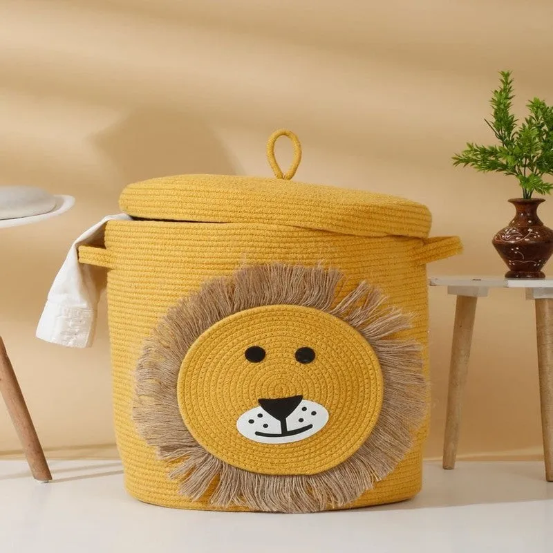 Yellow lidded storage basket with lion face motif and side handles