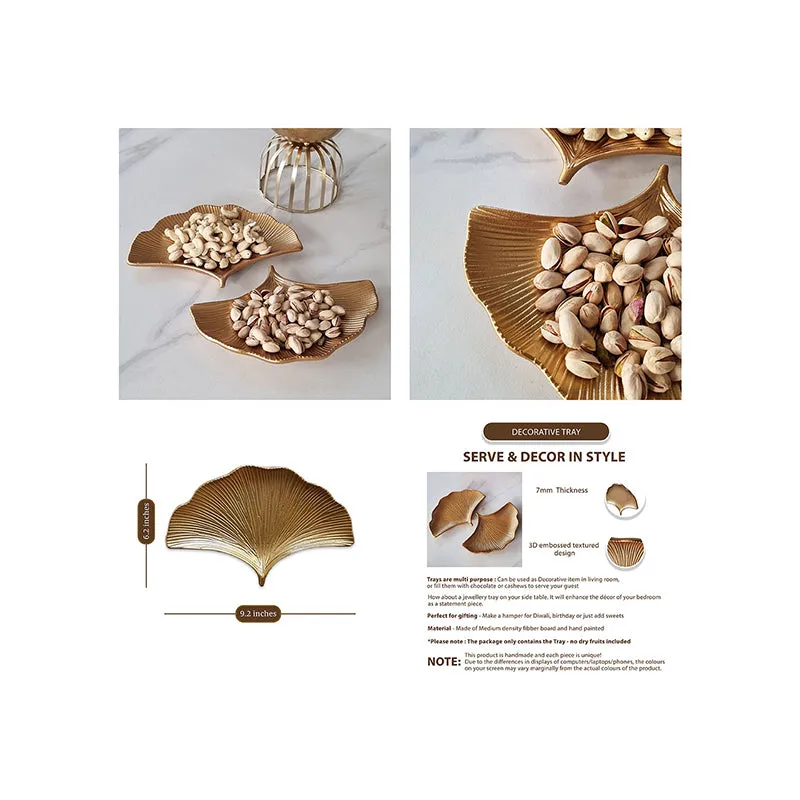 Gold ginkgo leaf platters shown with nuts and close-up texture details