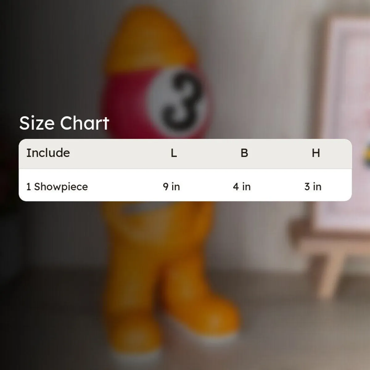 Blurred view of the figurine showpiece with a white information card overlay.